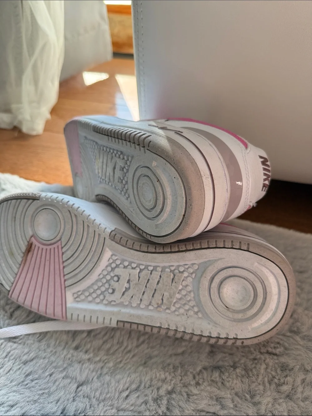 Nike Women's White Sneakers with Pink Swoosh